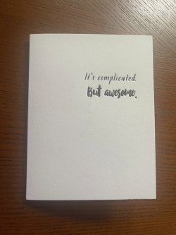 Photo of a greeting card with the words, "It's complicated, but awesome".